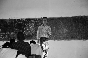 Jeremy Gernand teaching his ninth grade mathematics course 
			in Kanalabe, Guinea during the 1999-2000 school year.